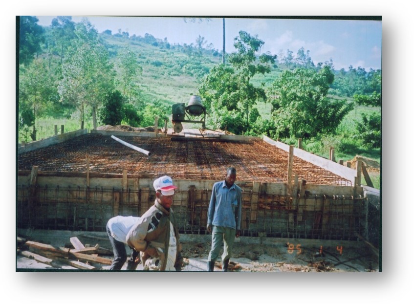 Nexus (U) Limited was entrusted with the construction of the Kanungu Bridge in Kanungu District, Uganda. This infrastructure project aimed to improve transportation, connectivity, and accessibility in the region, supporting economic development and improving the quality of life for local residents. Scope of the Construction Work The construction of Kanungu Bridge involved several key phases, from initial planning and design to final execution, with a focus on ensuring the bridge's structural integrity and longevity. Surveying and Design: The first phase of the project included detailed surveying of the site and designing a bridge structure that could withstand the region's environmental and traffic demands. The design process took into account local topography, hydrology, and soil conditions. Foundation Work: The foundation of the bridge was carefully designed to ensure stability and safety, with deep foundations constructed to support the weight of the bridge and the traffic it would carry. Bridge Deck and Superstructure: The bridge deck and superstructure were constructed using reinforced concrete and steel, materials chosen for their strength and durability. The deck was designed to accommodate vehicular traffic and pedestrian movement safely. Piling and Pier Construction: Strong and reliable piling and piers were built to ensure the bridge’s stability over the water and provide resistance to environmental factors like flooding and erosion. Approach Roads and Pavement: Nexus (U) Limited constructed the approach roads leading to the bridge, ensuring smooth connectivity with existing road networks. Proper paving and road signage were included for safe travel. Safety and Security Features: Safety railings, guardrails, and other protective measures were installed to ensure the safety of drivers and pedestrians. Proper signage and lighting were also added to enhance visibility, especially during the night. Environmental Considerations: Throughout the construction, Nexus (U) Limited implemented environmentally responsible practices, ensuring minimal disruption to local wildlife and ecosystems during the building process. Final Inspection and Testing: After construction was completed, the bridge was thoroughly inspected to ensure compliance with safety and quality standards. Load testing and other necessary assessments were conducted before the official opening. Benefits of the Kanungu Bridge Improved Accessibility: The completion of Kanungu Bridge has greatly improved transportation across the district, reducing travel time and connecting rural communities to nearby towns and cities. Economic Development: The bridge facilitates easier access to markets, services, and resources, benefiting local farmers, businesses, and residents. Enhanced Safety: The new bridge has provided a safer alternative to previous crossing methods, especially during rainy seasons when flooding and erosion were common concerns. Community Connectivity: The bridge plays a crucial role in connecting Kanungu District to other parts of Uganda, promoting regional integration and supporting infrastructure development. Completion and Outcome The Kanungu Bridge was successfully completed, with Nexus (U) Limited ensuring high standards of construction quality, safety, and environmental sustainability. The bridge now stands as a vital infrastructure asset, providing lasting benefits to the local community and supporting the broader development objectives of the region.